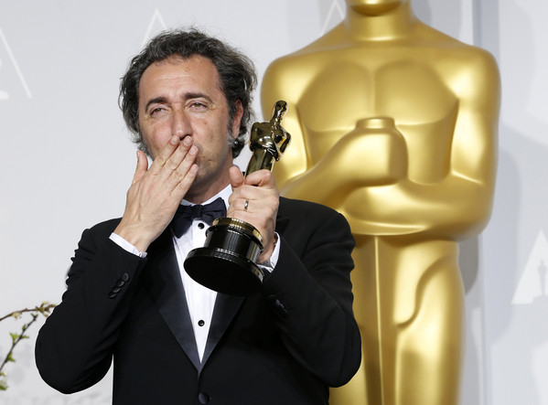 paolo-sorrentino-director-of-italian-film-the-great-beauty-poses-with-his-award-for-best-foreign-language-film-at-the-86th-academy-awards-in-hollywood